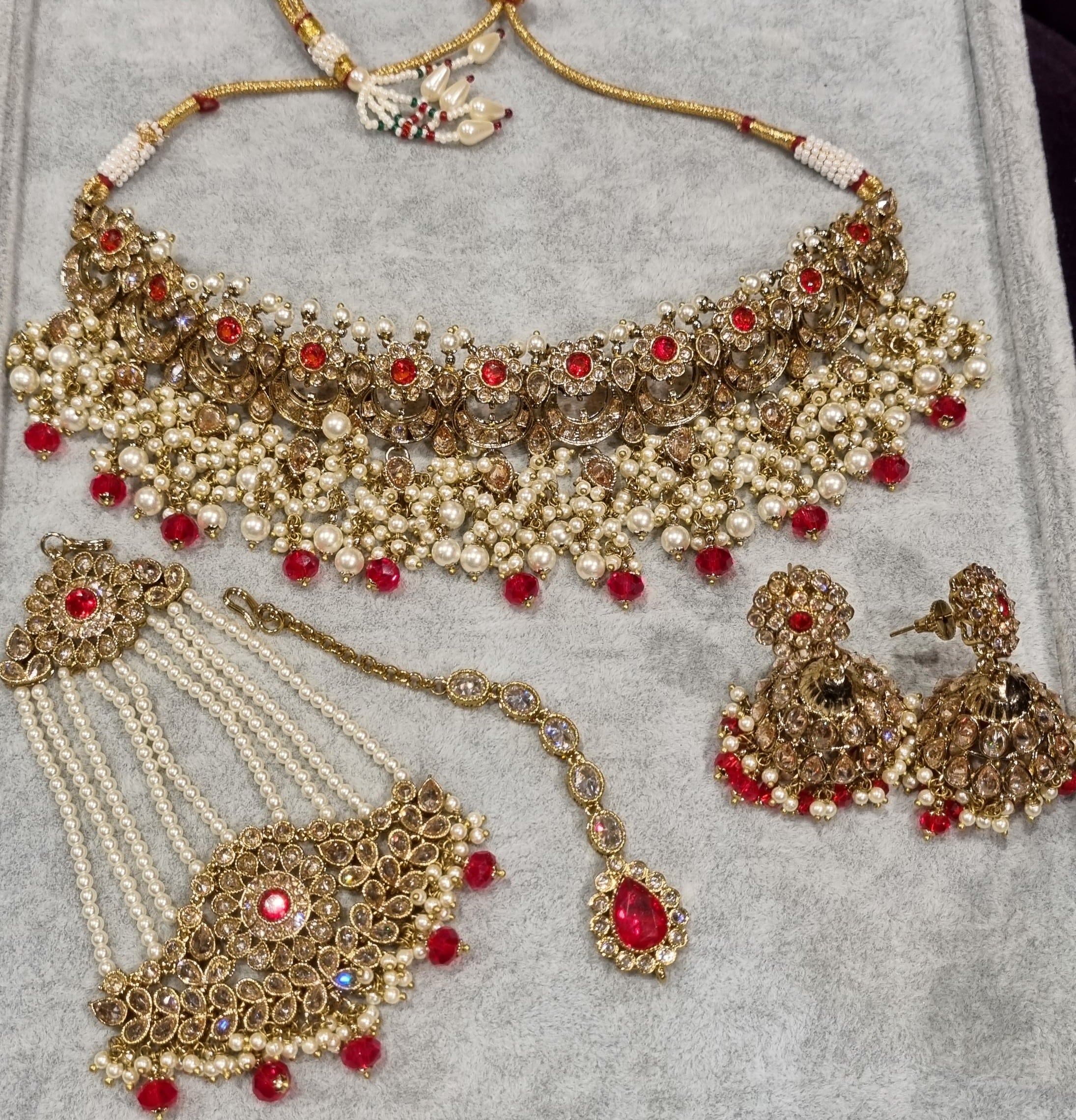 red crystal necklace with tikka.